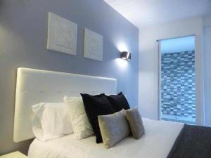 Postel nebo postele na pokoji v ubytování Apartamento Lola