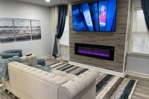 A television and/or entertainment centre at ATL XPLOR (8mins to Airport/10mins to midtown)
