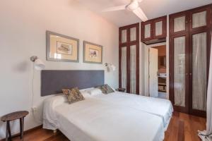 
A bed or beds in a room at MintyStay - Puerta Jerez
