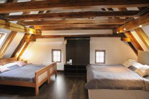 Voodi või voodid majutusasutuse Hotel Svambersky dum toas