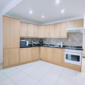Kuchyň nebo kuchyňský kout v ubytování Bonito Apartamento en Parque Santiago 2