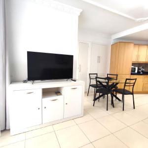 Kuchyň nebo kuchyňský kout v ubytování Bonito Apartamento en Parque Santiago 2