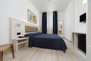 TV a/nebo společenská místnost v ubytování Hotel Giotto