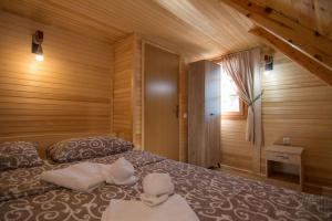 Llit o llits en una habitació de Arielove kolibe