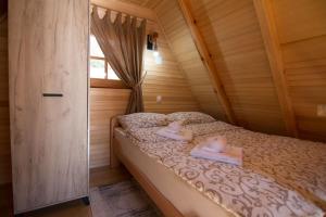 Llit o llits en una habitació de Arielove kolibe