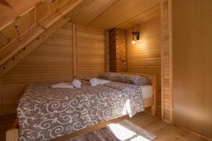 Llit o llits en una habitació de Arielove kolibe