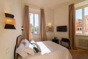 Postel nebo postele na pokoji v ubytování Relais Virgilio