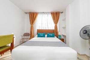Кровать или кровати в номере Ayenda Ambeima