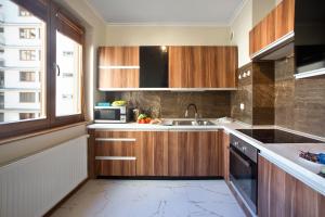Kuchyňa alebo kuchynka v ubytovaní P&O Serviced Apartments Bukowinska + 14 fotografií