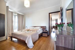 Posteľ alebo postele v izbe v ubytovaní P&O Serviced Apartments Bukowinska