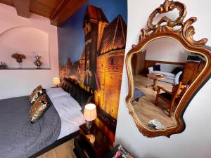 Posteľ alebo postele v izbe v ubytovaní Apartamenty MICHEL Gdańsk Centrum BOUTIQUE HOTEL
