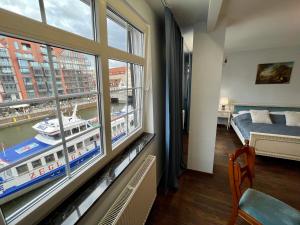 Posteľ alebo postele v izbe v ubytovaní Apartamenty MICHEL Gdańsk Centrum BOUTIQUE HOTEL