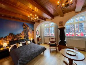 Posteľ alebo postele v izbe v ubytovaní Apartamenty MICHEL Gdańsk Centrum BOUTIQUE HOTEL