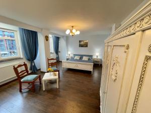 Posteľ alebo postele v izbe v ubytovaní Apartamenty MICHEL Gdańsk Centrum BOUTIQUE HOTEL