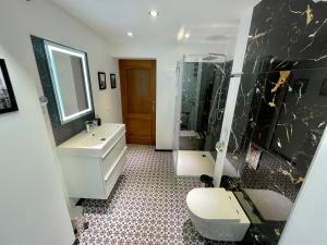 Kúpeľňa v ubytovaní Apartamenty MICHEL Gdańsk Centrum BOUTIQUE HOTEL