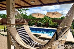 Πισίνα στο ή κοντά στο Villa Tropical La Fortuna