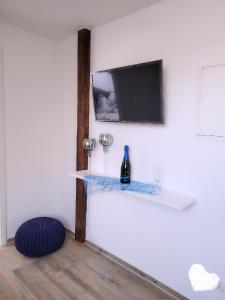 TV a/nebo společenská místnost v ubytování Stengels Sekt Appartements