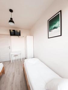 Posteľ alebo postele v izbe v ubytovaní Apartament Kraków Arena No. 100