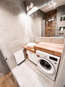 Kúpeľňa v ubytovaní Apartament Kraków Arena No. 100