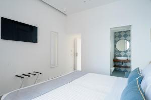Krevet ili kreveti u jedinici u okviru objekta Capri Marina Suite