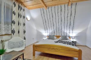 Posteľ alebo postele v izbe v ubytovaní KUROSOWY POTOK NOCLEGI ZAKOPANE CENTRUM + 5 fotografií