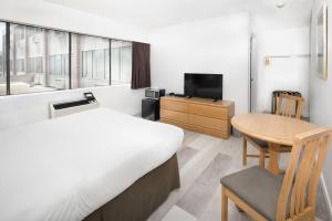Katil atau katil-katil dalam bilik di Cassandra Hotel