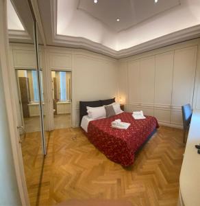 Ένα ή περισσότερα κρεβάτια σε δωμάτιο στο Spagna luxury suite Roma