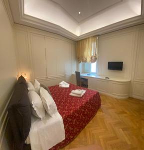 Lova arba lovos apgyvendinimo įstaigoje Spagna luxury suite Roma