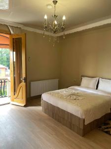 Postel nebo postele na pokoji v ubytování Hotel Shogi