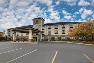 a large building with a clock on the side of it at Holiday Inn Express Marshall, an IHG Hotel in Marshall