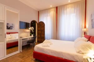 a hotel room with a bed and a desk at Hotel Villa Alberti Portofino Land in Santa Margherita Ligure +37 photos