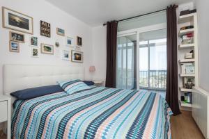 Ein Bett oder Betten in einem Zimmer der Unterkunft BCN- Views to the Sea