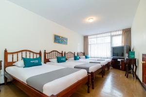 Postel nebo postele na pokoji v ubytování Casa Hostal Norte