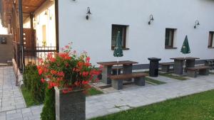 A garden outside OÁZA PENZIÓN