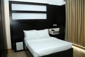 Katil atau katil-katil dalam bilik di Hotel Capitol