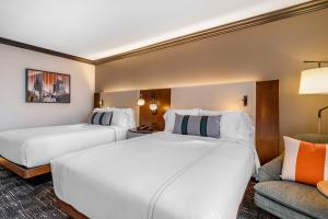 Postel nebo postele na pokoji v ubytování Omni Austin Hotel Downtown