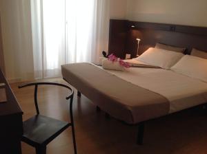 Postel nebo postele na pokoji v ubytování GFH - Hotel Ruhig