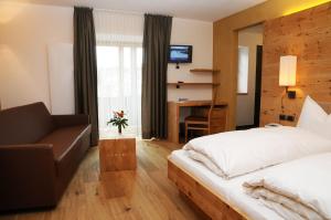 Postel nebo postele na pokoji v ubytování Hotel Olaga + 24 fotografií