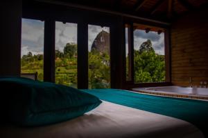 Letto o letti in una camera di Sotavento Cabañas