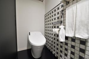 Un baño de HOTEL TAVINOS Asakusa