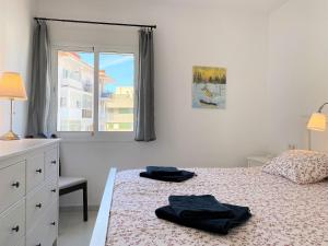Łóżko lub łóżka w pokoju w obiekcie Apartamento La Torna Casasol
