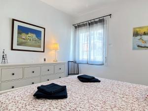 Łóżko lub łóżka w pokoju w obiekcie Apartamento La Torna Casasol