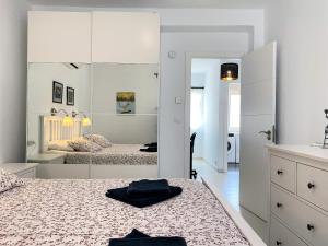 Łóżko lub łóżka w pokoju w obiekcie Apartamento La Torna Casasol