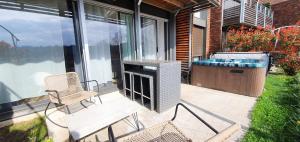 Taman di luar Les Vagues avec Jacuzzi Privatif & Parking Privé +3 gambar