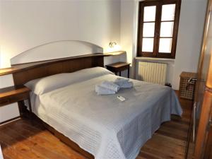 Krevet ili kreveti u jedinici u okviru objekta Casa Catullo