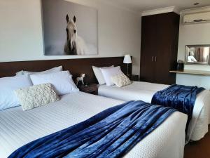 Postel nebo postele na pokoji v ubytování Tourist Road - 2 Bedroom Unit - East Toowoomba