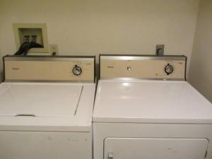 two old refrigerators are sitting in a room at Cozy Pocono Cottage near Jack Frost Jim Thorpe in Albrightsville +10 photos