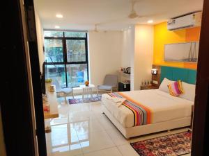 Ένα ή περισσότερα κρεβάτια σε δωμάτιο στο Hotel White Fields Hitec City, Hyderabad