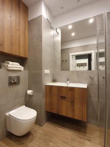 Kúpeľňa v ubytovaní Chopin Apartments - City + 35 fotografií