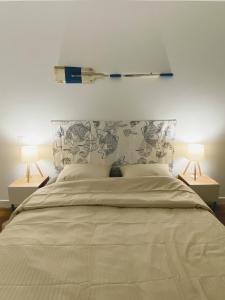 Postel nebo postele na pokoji v ubytování Le Pontappart